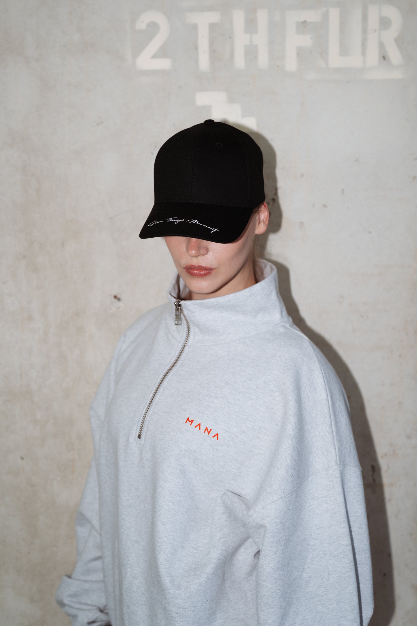 MANA SPC Cap Black — Peace Through Movement embroidery